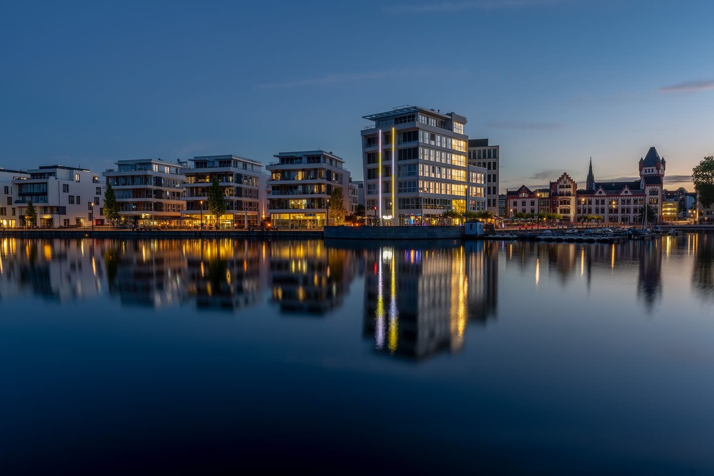 view of a city with water in the foreground
